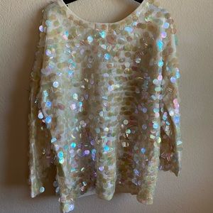 Beautiful 1960s sweater with large sequins.